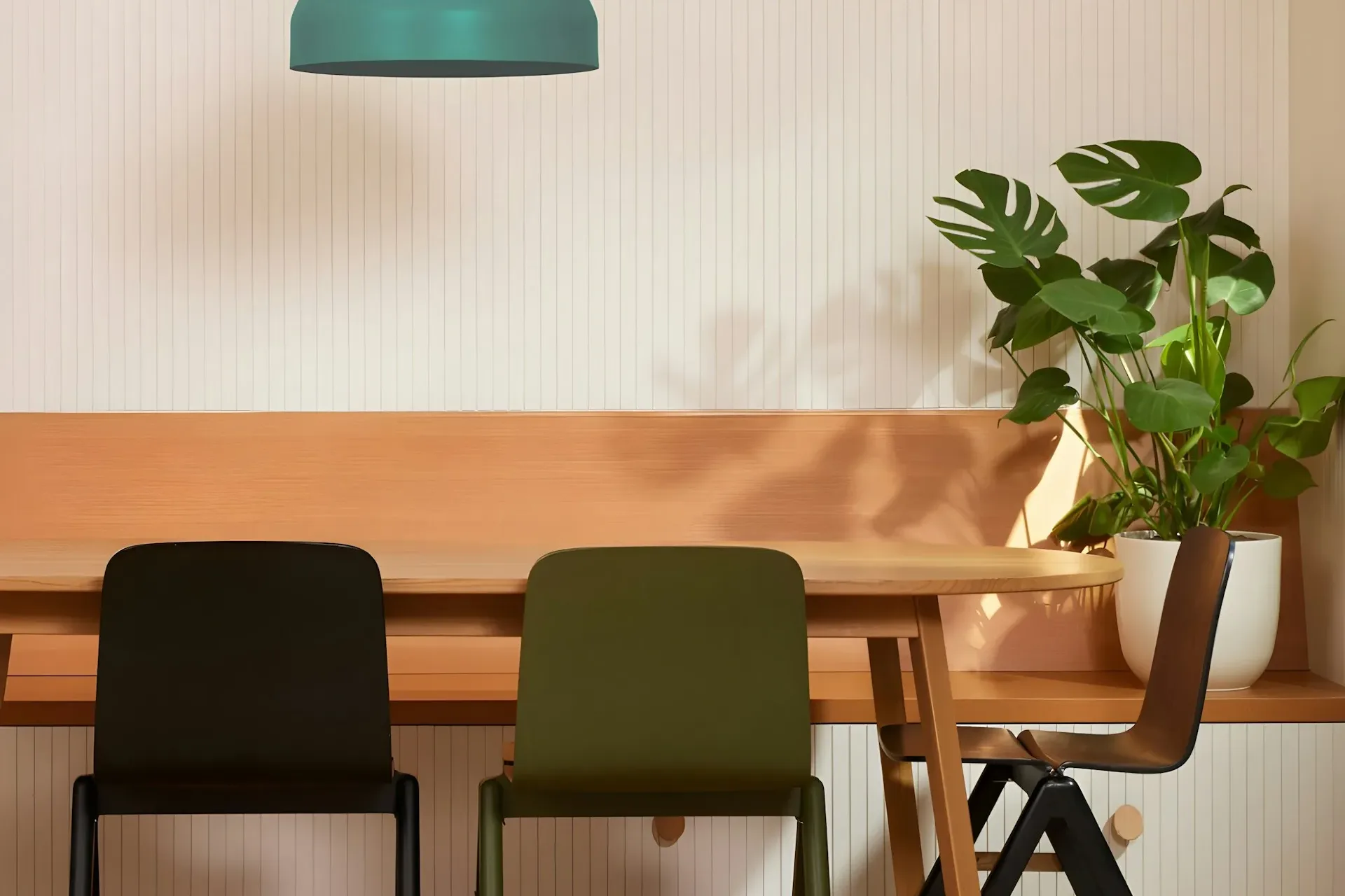 Leadership team gathered around a conference table during a brand strategy workshop, representing the challenge of making organizational narrative accessible and transferable