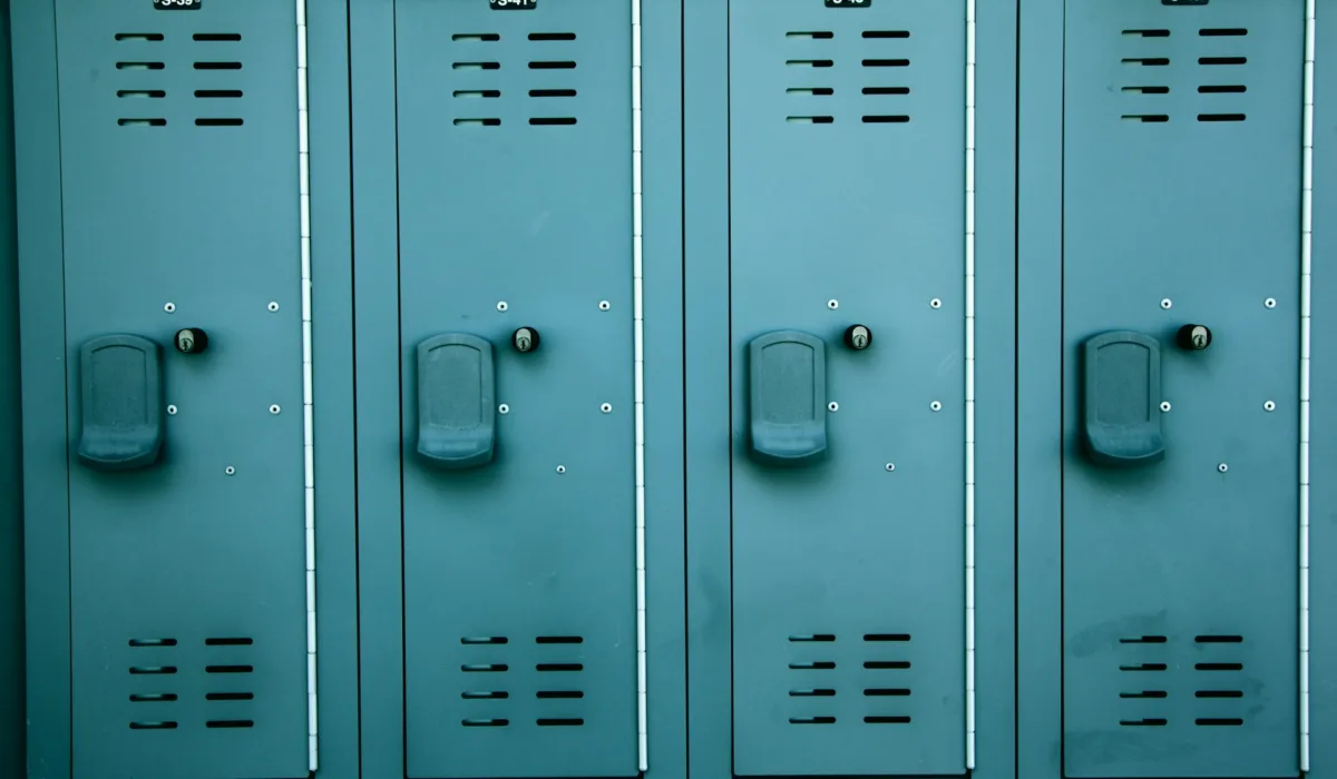 Teal lockers in uniform rows symbolizing structure and business clarity.