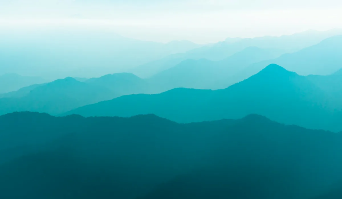 Calm ocean scene with teal water and sky